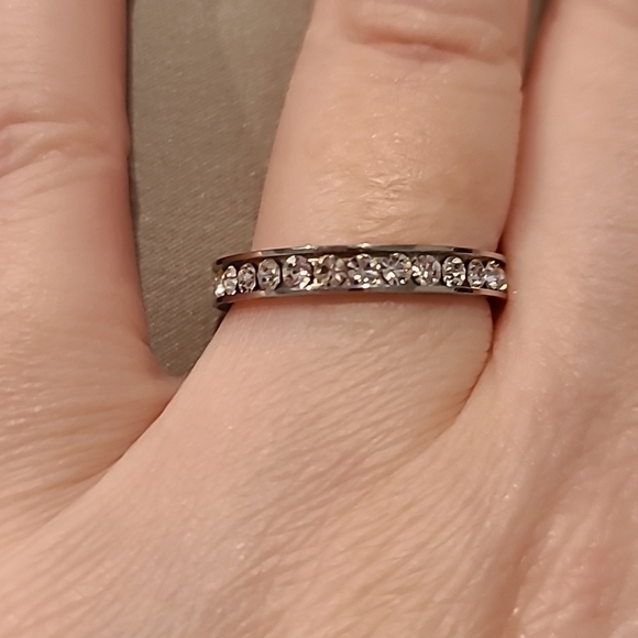 Girl Smiles Jewelry - Eternity style cubic zirconia stainless steel channel set stones ring